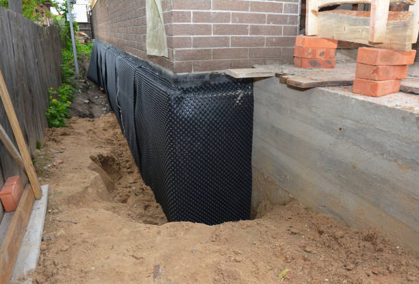 SJ Waterproofing Pros technician performing targeted Vapor Barrier Installation assessment in Whitestown, IN